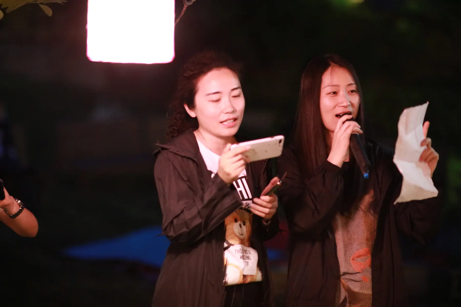 A stage reading with several voices gathered in live space